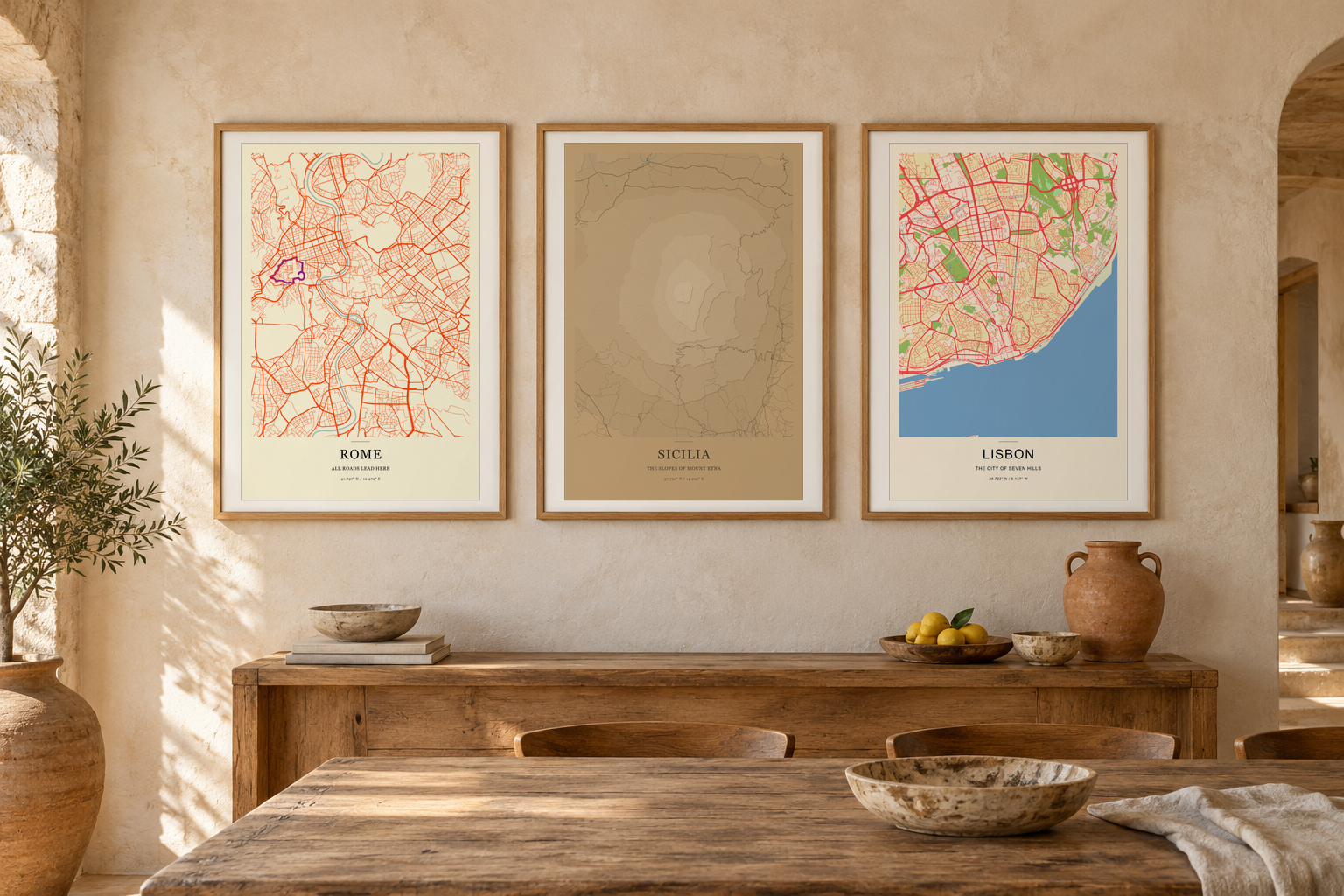 Rome, Sicily and Lisbon studio prints in oak frames above a Mediterranean dining table